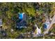 Property and pool view from overhead perspective at 5027 Sunrise S Dr, St Petersburg, FL 33705