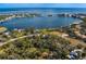 Aerial view of waterfront property and neighborhood at 5027 Sunrise S Dr, St Petersburg, FL 33705