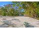 Landscaped front yard with gravel and large rocks at 5027 Sunrise S Dr, St Petersburg, FL 33705