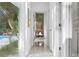 Bright hallway with terrazzo floors and access to pool at 5027 Sunrise S Dr, St Petersburg, FL 33705