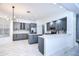 Modern kitchen with gray cabinets and marble floors at 5103 Ashcrest Ct, Tampa, FL 33647