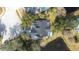 Aerial view of the house, highlighting its location and backyard at 5200 Lagos Ct, New Port Richey, FL 34655