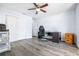 Home office featuring wood flooring and ceiling fan at 5200 Lagos Ct, New Port Richey, FL 34655