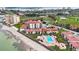 Aerial view showcasing beachfront location and pool at 6051 Sun Blvd # 504, St Petersburg, FL 33715