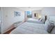 Bright bedroom with two twin beds, ample light, and a view at 6051 Sun Blvd # 504, St Petersburg, FL 33715