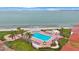 Aerial view of resort-style pool and beach access at 6051 Sun Blvd # 504, St Petersburg, FL 33715