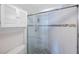 Clean shower with glass enclosure and pebble floor at 6051 Sun Blvd # 504, St Petersburg, FL 33715