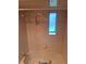 A small bathroom with a shower/tub combo and window at 6549 Brentwood Dr, Zephyrhills, FL 33542