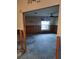 Living room under renovation, showing exposed walls and flooring at 6549 Brentwood Dr, Zephyrhills, FL 33542