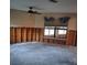 Renovation needed in this living room, exposed walls and flooring at 6549 Brentwood Dr, Zephyrhills, FL 33542