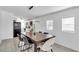 Dining room with a dark wood table and six chairs at 6706 S Kissimmee St, Tampa, FL 33616