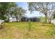 Large backyard with screened enclosure at 8535 Delaware Dr, Weeki Wachee, FL 34607