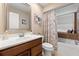 Clean bathroom with a tub, shower, and updated vanity at 8535 Delaware Dr, Weeki Wachee, FL 34607