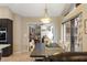 Dining area with farmhouse table and view of the pool at 8535 Delaware Dr, Weeki Wachee, FL 34607