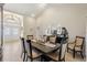 Elegant dining room featuring a dark wood table and neutral decor at 8535 Delaware Dr, Weeki Wachee, FL 34607