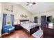 Spacious main bedroom with hardwood floors and sitting area at 8535 Delaware Dr, Weeki Wachee, FL 34607