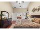 Large main bedroom with ensuite bathroom access at 8535 Delaware Dr, Weeki Wachee, FL 34607