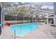 Inviting screened pool with ample patio space at 8535 Delaware Dr, Weeki Wachee, FL 34607