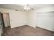 Bedroom with ceiling fan, neutral walls, and plush carpeting at 8615 Greenfield Ln, Zephyrhills, FL 33541