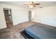 Spacious bedroom with ensuite bathroom and large closet at 8615 Greenfield Ln, Zephyrhills, FL 33541