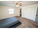 Bright bedroom with ensuite bathroom and large closet at 8615 Greenfield Ln, Zephyrhills, FL 33541