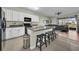 Modern kitchen with white cabinets and granite countertops at 8967 Indigo Trail Loop, Riverview, FL 33578