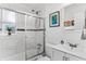 Updated bathroom with a tub/shower combo and a modern vanity at 911 16Th Nw Ave, Largo, FL 33770