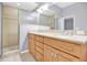 Bathroom with double vanity and shower at 9715 Taylor Rose Ln # 9715, Seminole, FL 33777