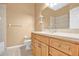 Small bathroom with wood vanity and shower/tub combo at 9715 Taylor Rose Ln # 9715, Seminole, FL 33777