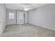 Bedroom with tile floor and sliding doors to balcony at 9715 Taylor Rose Ln # 9715, Seminole, FL 33777