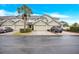 Townhome building with parking in front at 9715 Taylor Rose Ln # 9715, Seminole, FL 33777