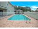 Refreshing community pool with ample deck space at 9715 Taylor Rose Ln # 9715, Seminole, FL 33777