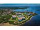 Waterfront community with lush landscaping at 102 Mariner Dr, Tarpon Springs, FL 34689