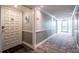 Clean hallway with neutral colors and carpeted floors at 102 Mariner Dr, Tarpon Springs, FL 34689