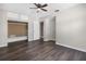 Spacious bedroom with wood-look floors and a large closet at 11320 114Th Ave, Largo, FL 33778