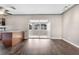 Dining area with wood-look floors and access to a sunroom at 11320 114Th Ave, Largo, FL 33778