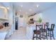 Modern kitchen with white cabinets and granite countertops at 11511 Lounds Ct, New Port Richey, FL 34654