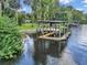 Private boat dock with covered area and plenty of space for multiple boats at 11624 Monette Rd, Riverview, FL 33569