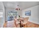 Bright dining room with sliding doors leading to a pool and patio area at 11624 Monette Rd, Riverview, FL 33569