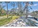 Spacious riverfront property with grassy lawn and private dock at 11624 Monette Rd, Riverview, FL 33569