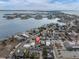 Aerial view of property near the water and other homes at 117 73Rd Ave, St Pete Beach, FL 33706