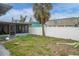 Backyard view showing a house exterior and palm tree at 117 73Rd Ave, St Pete Beach, FL 33706