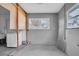 Large workshop area with windows and unfinished walls at 117 73Rd Ave, St Pete Beach, FL 33706