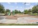 Modern playground with a see-saw and swings at 12292 Lyon Pine Ln, Odessa, FL 33556