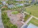 Community playground with nature-inspired equipment at 12292 Lyon Pine Ln, Odessa, FL 33556