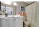 Clean bathroom with white vanity and shower/tub combo at 1400 Gandy N Blvd # 1407, St Petersburg, FL 33702