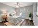 Bedroom with queen-size bed, nightstands, and ceiling fan at 1400 Gandy N Blvd # 1407, St Petersburg, FL 33702