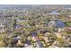 Wide aerial view of neighborhood near a lake at 14031 Shady Shores Dr, Tampa, FL 33613