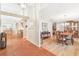 Formal dining room with hardwood floors and a view of the entryway at 14031 Shady Shores Dr, Tampa, FL 33613