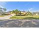 Single-story house with attached garage and manicured lawn at 14031 Shady Shores Dr, Tampa, FL 33613